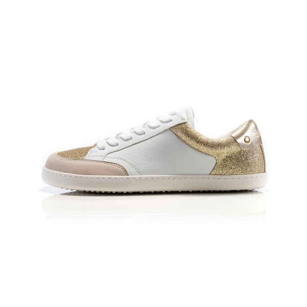 CHARM Light Gold Leather barefoot sneakers.
