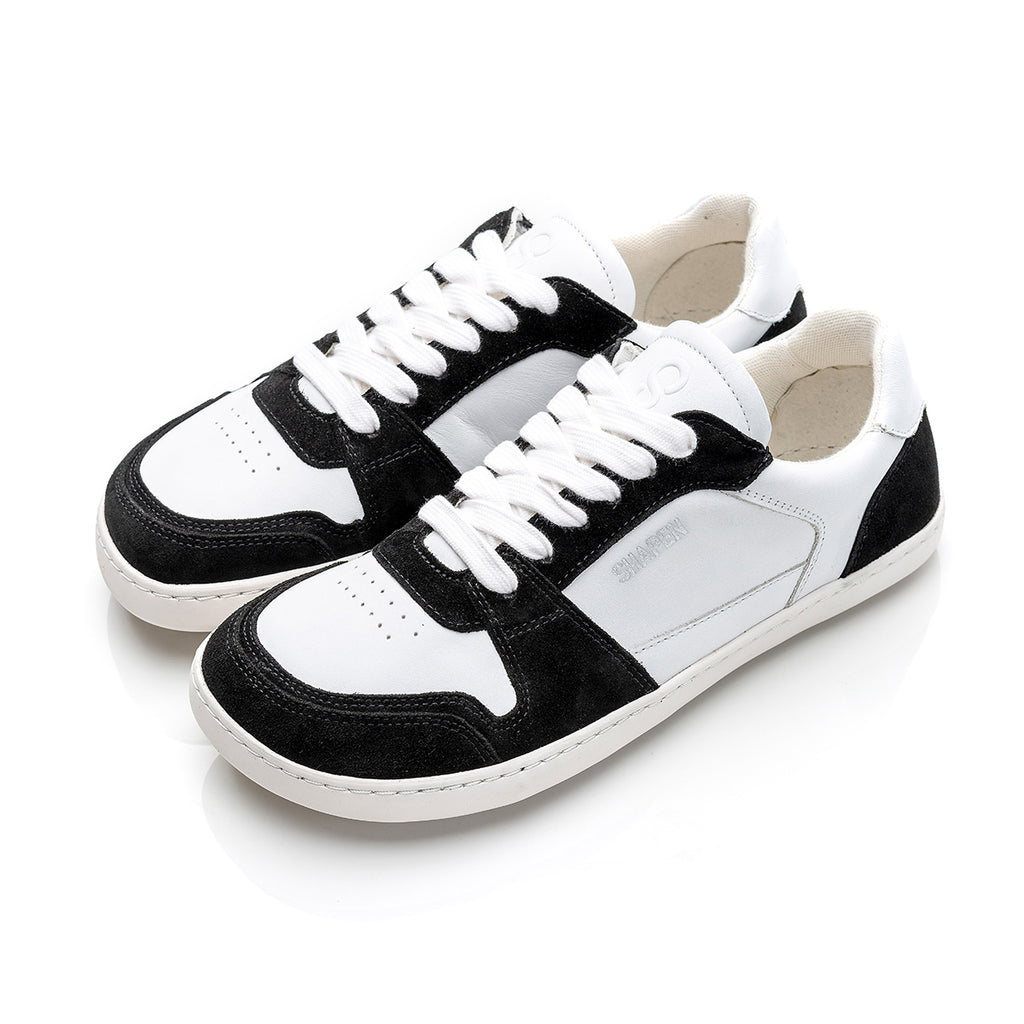 RE:WIND Black & White Leather barefoot sneakers.